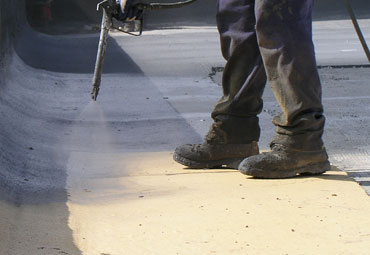 Coating systems over Huntington Beach spray foam roof systems