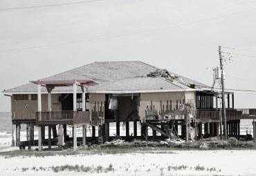 Wind damage - spray foam can help prevent uplift to Huntington Beach roofs